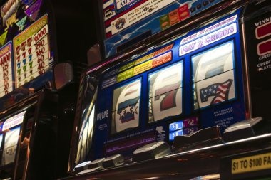 Live dealer studio with multiple blackjack and roulette tables during peak tournament hours